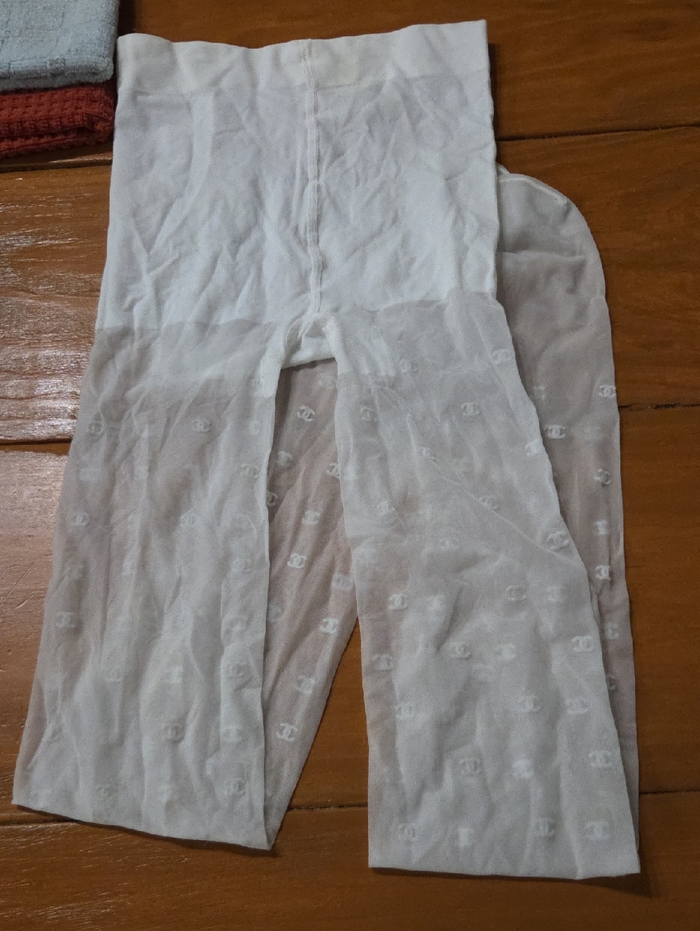 CHANEL Sheer White Monogram Tights